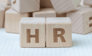 light brown blocks stacked beside each other spelling